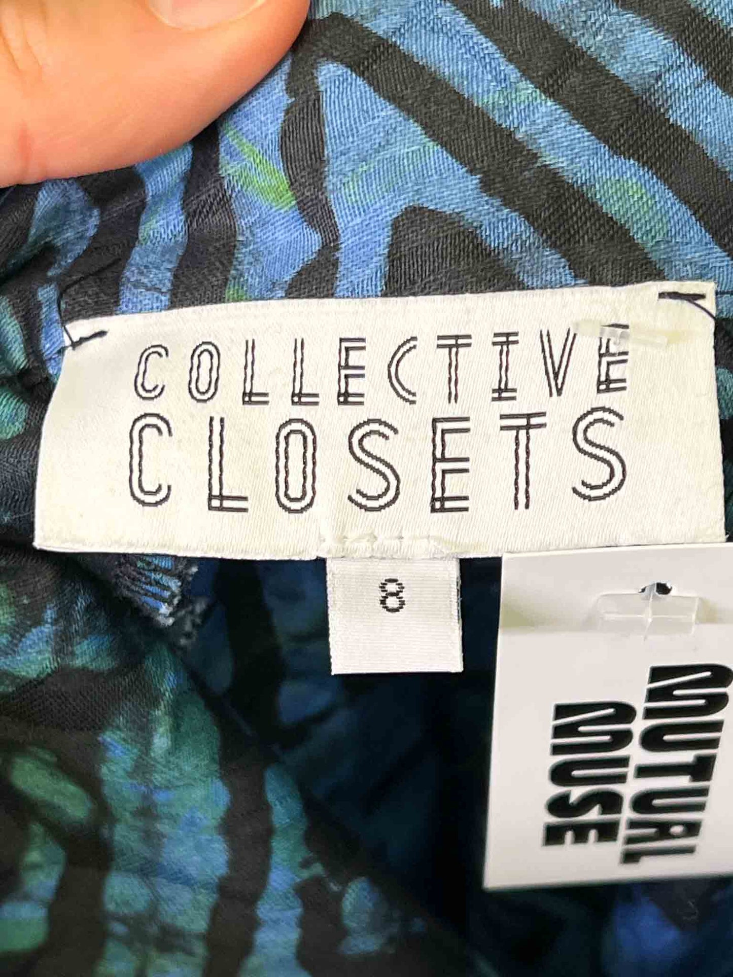 Size 8 | Collective Closets Triangle Print Mini Skirt
