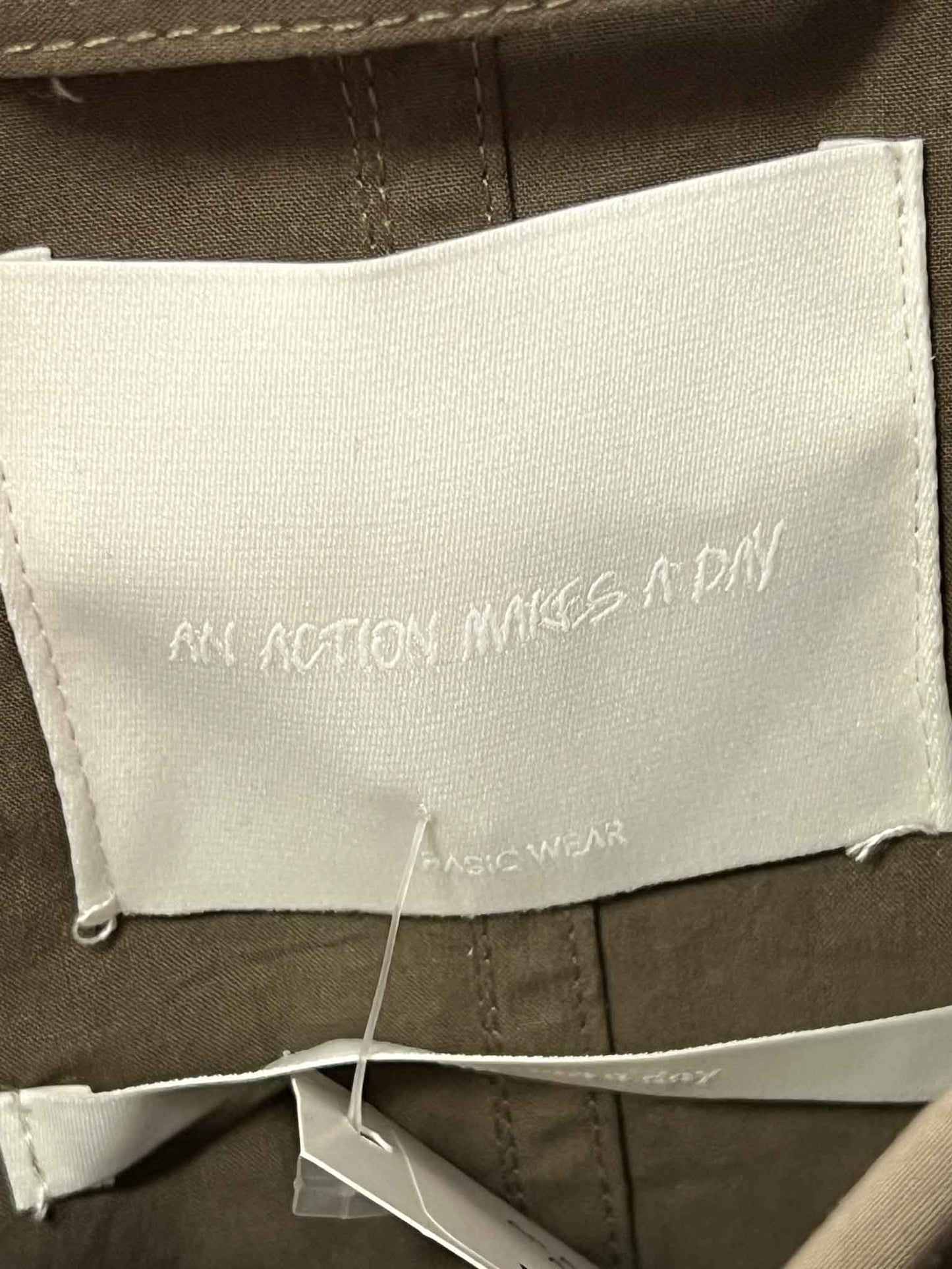 Size L | An Action A Day Swishy Nylon Trench Coat