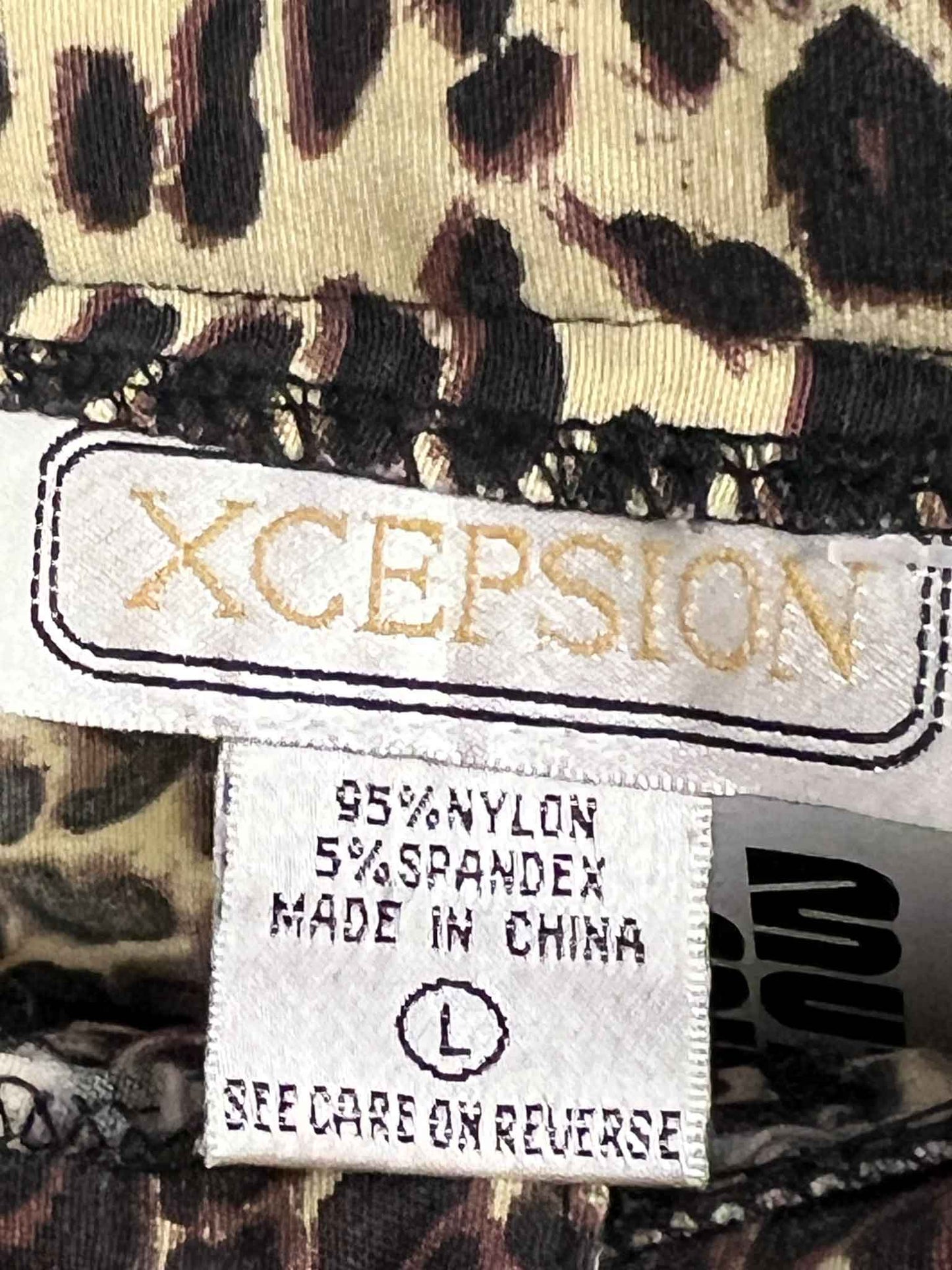 Size L | Xcepsion Vintage Leopard Flare Pants