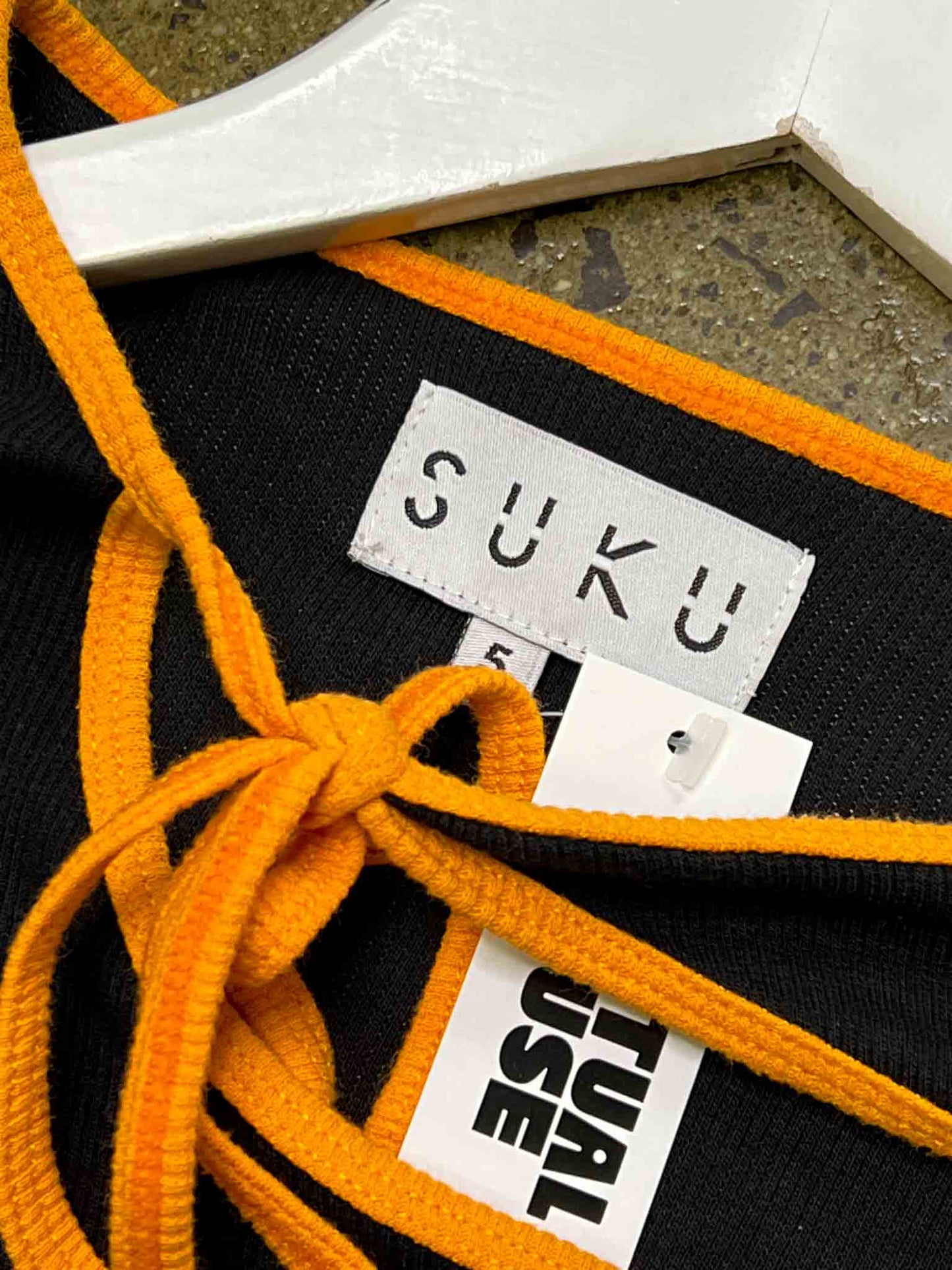 Size S | SUKU Black/Orange Cotton Asymmetric Long Sleeve Top